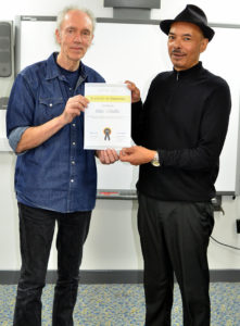 Author Phil Page awarding a Certificate of Completion
